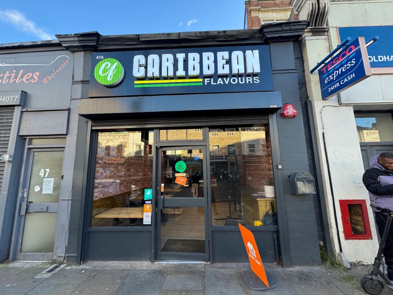 Caribbean Flavours shopfront on Goldhawk Road, Shepherd's Bush
