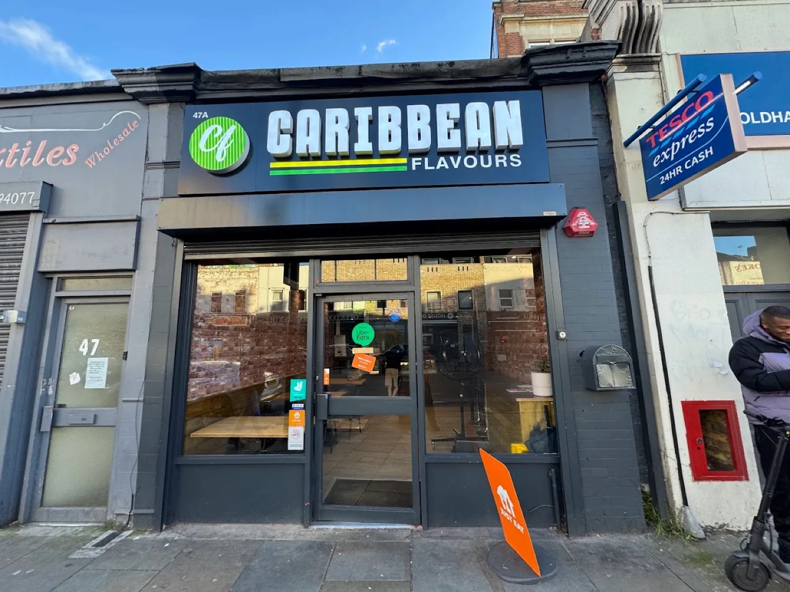 Caribbean Flavours shopfront on Goldhawk Road, Shepherd's Bush